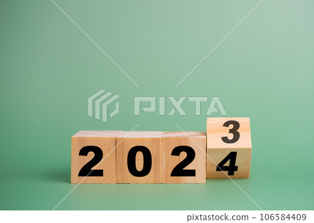 wood cube block 2024 business growth concept. New year business goals, plan and strategy. wood cube block 2024 business growth concept. New year business goals, plan and strategy. 106584409
