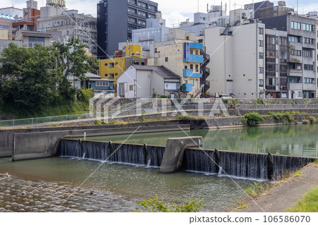 Weir on Saigawa River, Kanazawa, Japan. 106586070