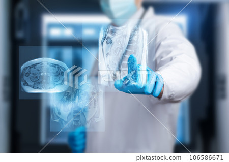 The doctor examines images of internal organs. The doctor examines images of internal organs. 106586671