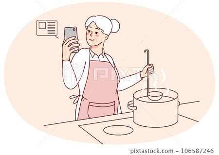 Elderly woman cooking with recipe on cellphone Elderly woman cooking with recipe on cellphone 106587246