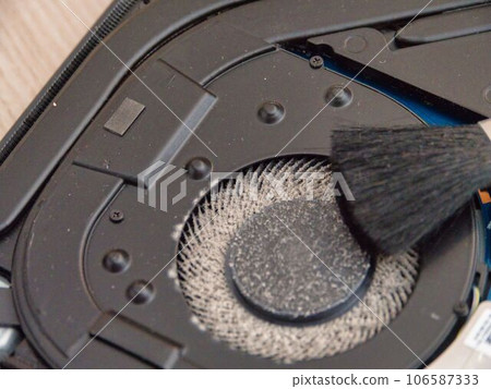 cleaning the cooler with a brush, close-up 106587333