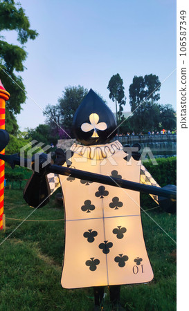 giant cards in wonderland, in the park. 106587349