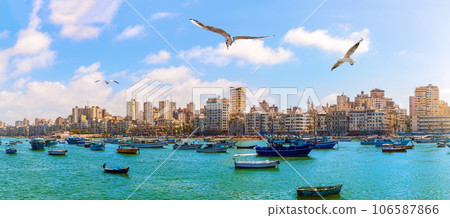 Alexandria harbour with azure waters and boats, beautiful seaside view, Egypt Alexandria harbour with azure waters and boats, beautiful seaside view, Egypt 106587866