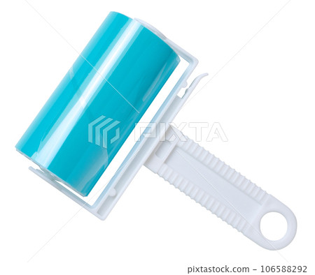 Roller with sticky tape for cleaning clothes on a white background, top view Roller with sticky tape for cleaning clothes on a white background, top view 106588292