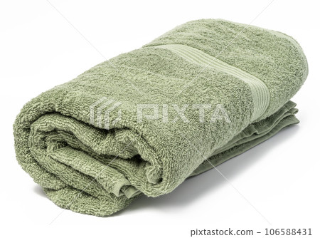 Twisted terry green towel on white background 106588431