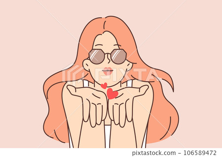 Romantic woman blows kiss and looks at screen to seduce and charm or invite viewer on date Romantic woman blows kiss and looks at screen to seduce and charm or invite viewer on date 106589472