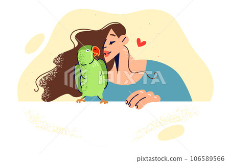 Woman kisses green parrot, rejoicing at presence of beloved pet and enjoying communication with bird Woman kisses green parrot, rejoicing at presence of beloved pet and enjoying communication with bird 106589566