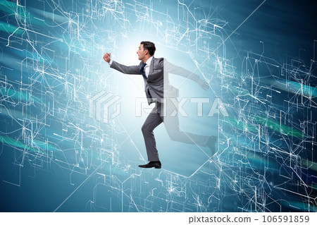 Businessman entering virtual world in business concept Businessman entering virtual world in business concept 106591859