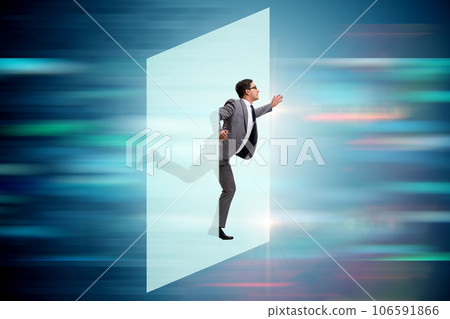 Businessman entering virtual world in business concept Businessman entering virtual world in business concept 106591866