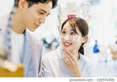 Couple shopping at a select shop Couple shopping at a select shop 106591906