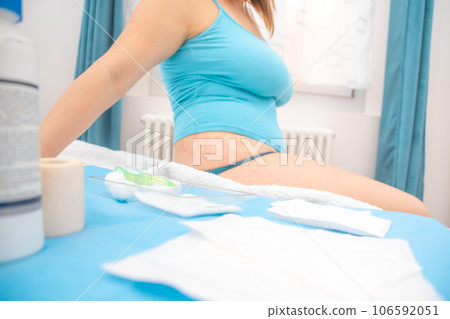 Woman stretched out with Dermatitis and Aid kit showing Healing processes Woman stretched out with Dermatitis and Aid kit showing Healing processes 106592051