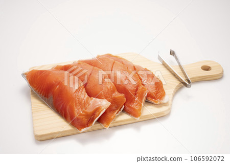 4 pieces of coho salmon, boneless and cooked without the spines 4 pieces of coho salmon, boneless and cooked without the spines 106592072
