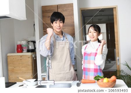 Young couple cooking in the kitchen 106593493