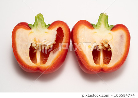 Cross section of red paprika - halved Cross section of red paprika - halved 106594774