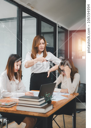 explain strategy at corporate group meeting, multiethnic staff listen to boss instruct interns at briefing 106594994