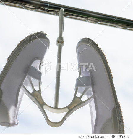 Hang your slippers to dry 106595862