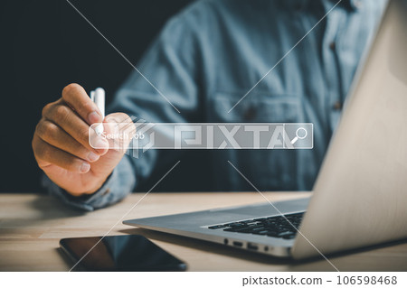 Conceptual image of a man diligently searching for job vacancies and career opportunities on a computer screen, guided by a digital pen as he explores the vast realm of online employment options. 106598468