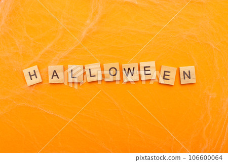 the inscription halloween sale on orange background with spider web the inscription halloween sale on orange background with spider web 106600064