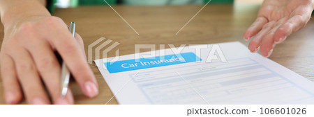 Woman agent of insurance company offering to sign car insurance contract 106601026