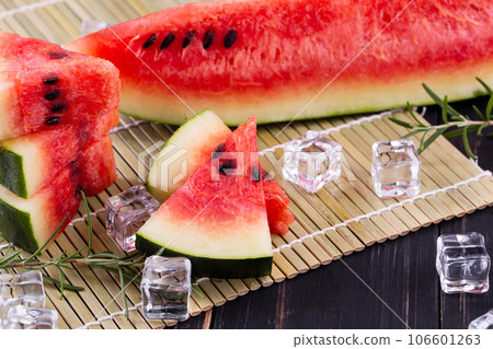 watermelon on wooden background 106601263