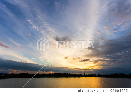 colorful dramatic sky with cloud at sunset. 106601322
