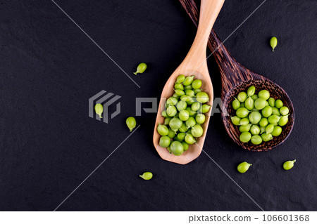 Sugar snap peas with mint on a rustic wood background 106601368