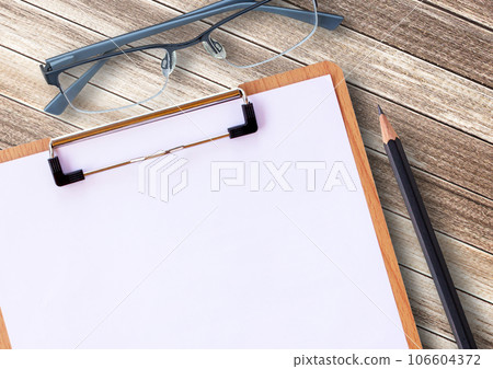 Medical clipboard and glasses with pencil Medical clipboard and glasses with pencil 106604372