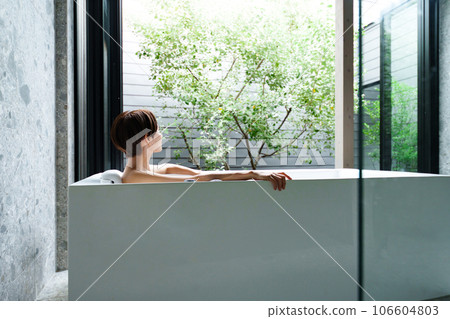 Half bathing woman Half bathing woman 106604803