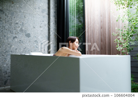 Half bathing woman Half bathing woman 106604804