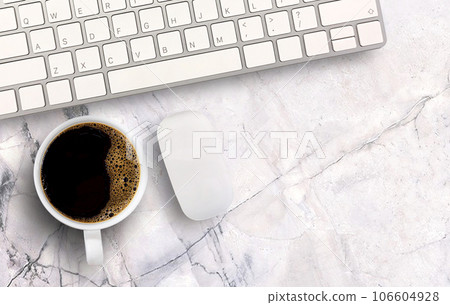 Morning black coffee and mini mouse and keyboard wireless on white marble background. 106604928