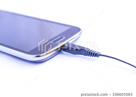 Close up black smartphone and USB cable on white background Close up black smartphone and USB cable on white background 106605065
