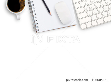 keyboard and coffee on desktop in office 106605159