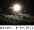 clouds illuminated by the full moon 106605654