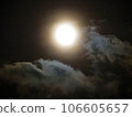 clouds illuminated by the full moon 106605657