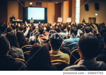 Engaging Speaker at Conference Hall Rear View of Audience in Business and Education Concept. created with Generative AI 106607785