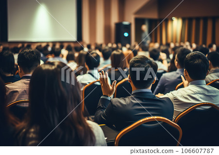 Engaging Speaker at Conference Hall Rear View of Audience in Business and Education Concept. created with Generative AI 106607787