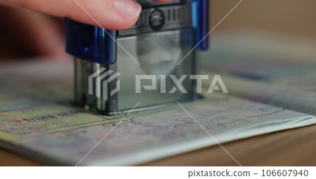 The concept of obtaining a stamp in the passport on entry into the territory of another state. Visa stamp in passport ID. Entry in foreign country. 106607940