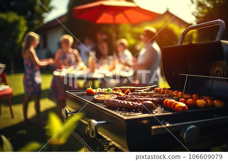 Family and Friends Gather for a Joyful Picnic Barbecue Grill in the Garden, Sharing Laughter, Food, and Moments of Togetherness. created with Generative AI 106609079
