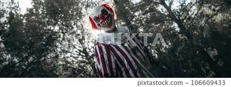 mad evil clown in the woods, banner format 106609433