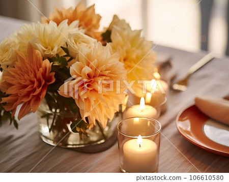 Beautiful fall table setting, autumn dinner table decoration with flowers and candles, holiday event decor in orange and yellow colors Beautiful fall table setting, autumn dinner table decoration with flowers and candles, holiday event decor in orange and yellow colors 106610580