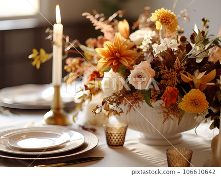 Beautiful fall table setting, autumn dinner table decoration with flowers and candles, holiday event decor in orange and yellow colors Beautiful fall table setting, autumn dinner table decoration with flowers and candles, holiday event decor in orange and yellow colors 106610642