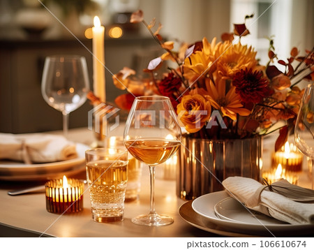 Beautiful fall table setting, autumn dinner table decoration with flowers and candles, holiday event decor in orange and yellow colors Beautiful fall table setting, autumn dinner table decoration with flowers and candles, holiday event decor in orange and yellow colors 106610674