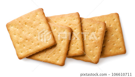 Square crackers cookies closeup on a white. Top view Square crackers cookies closeup on a white. Top view 106610711