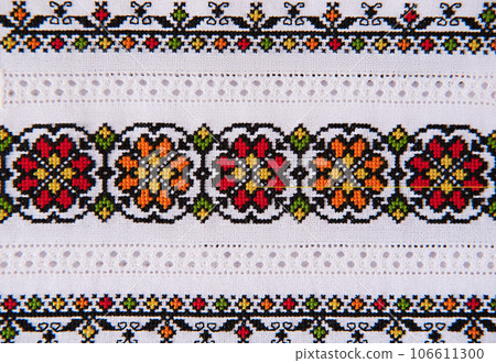 Slavic cross stitch by colored threads. Design of ethnic pattern. Background with Embroidery Texture Slavic cross stitch by colored threads. Design of ethnic pattern. Background with Embroidery Texture 106611300