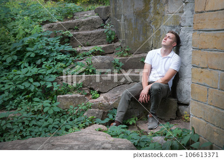 Sad men sitting on the steps 106613371