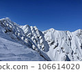 Karamatsudake in the Northern Alps in winter rising against the blue sky 106614020