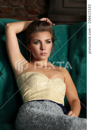 Perfect young adult woman resting indoor. Beautiful female face, fashion portrait Perfect young adult woman resting indoor. Beautiful female face, fashion portrait 106615583