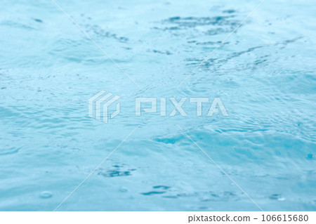 Drops on water surface, clean watery surface. Nature background. 106615680