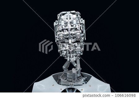 head of anthropomorphic robot capable of imitating emotions, without an outer shell skin, on a black background 106616098