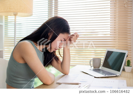 Young woman stressed or worried about doing a wrong job, Despair or disappointment, Sad feeling, Suffering, Desperate, Hopeless, Fail, disastrous, bankrupt, Scared, panicky, Failure of life. 106616482